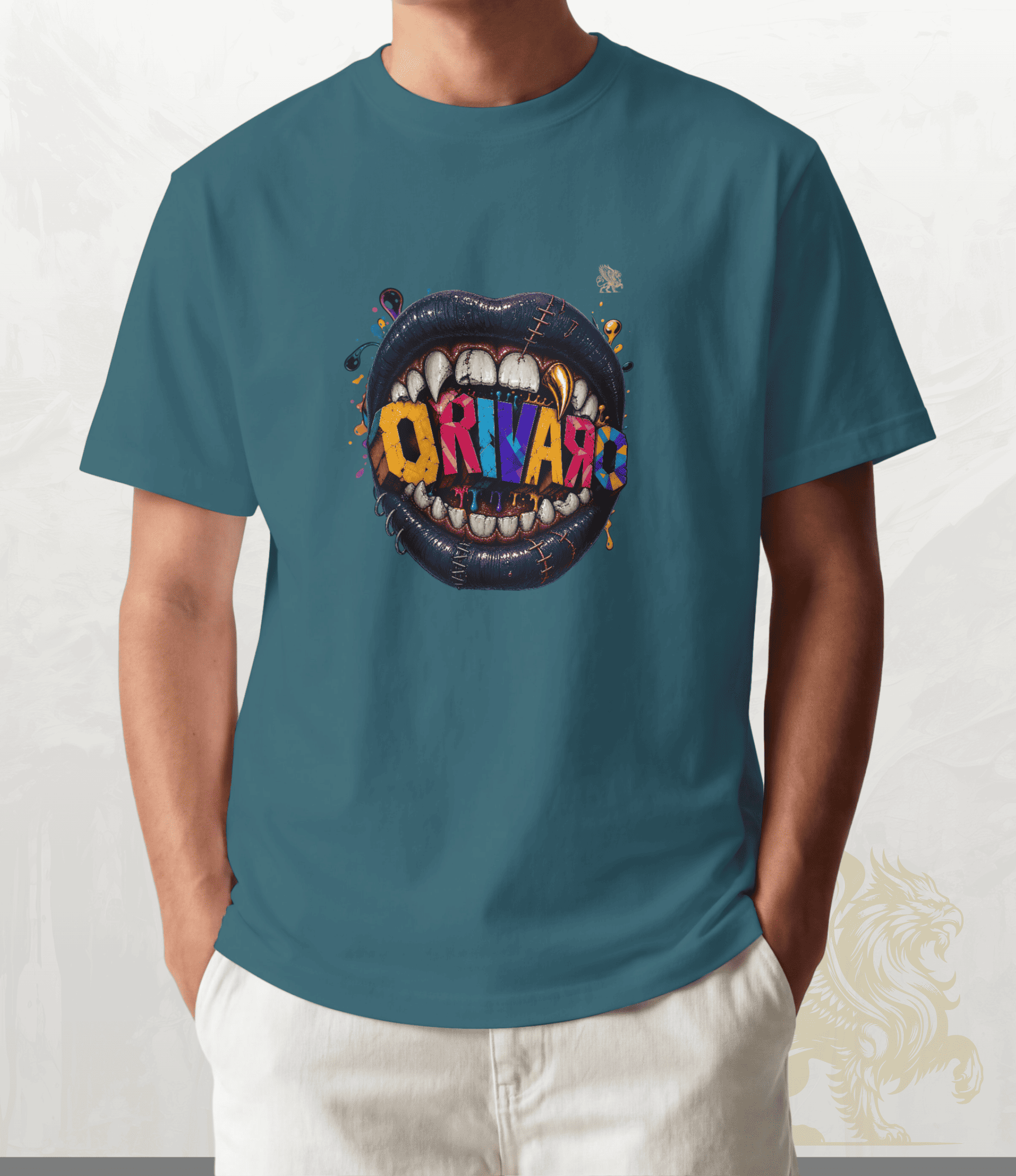 A person wearing a teal blue t-shirt with a colourful graphic of an open mouth containing the word 'ORIVARO' in multi-coloured letters, paired with off-white pants.