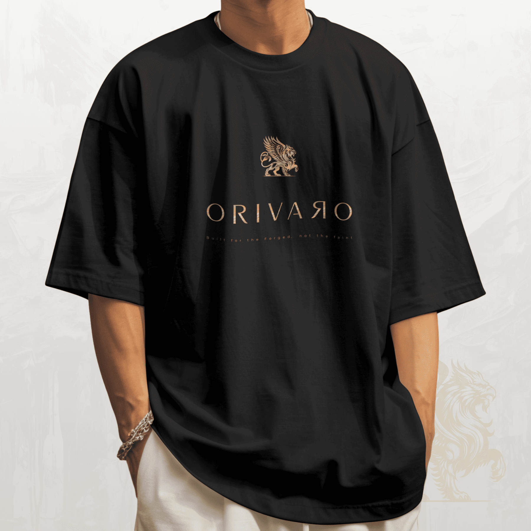 Person wearing a black t-shirt with 'Orivaro' logo on a white background