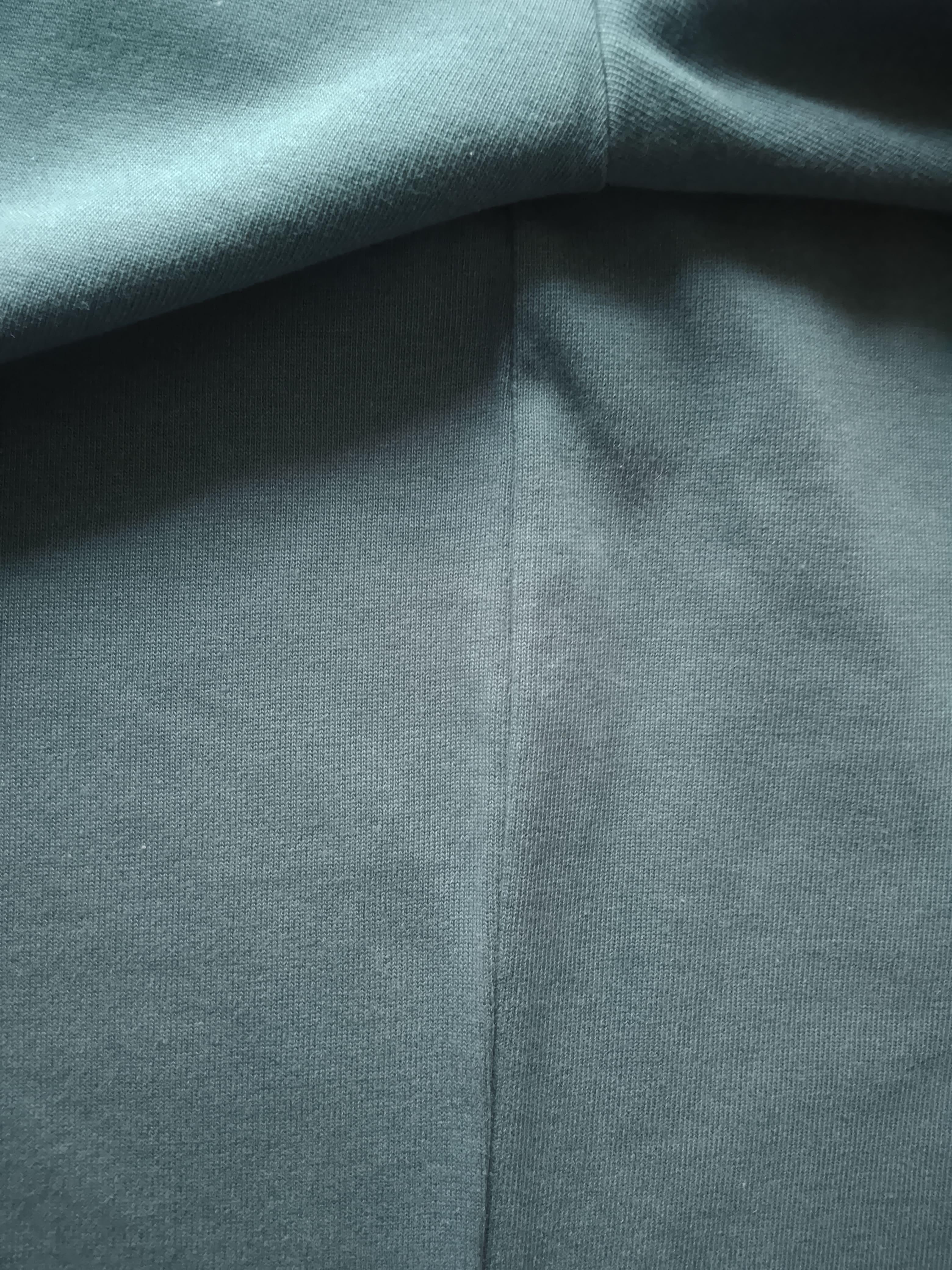 Close up of side seem on a luxury t-shirt