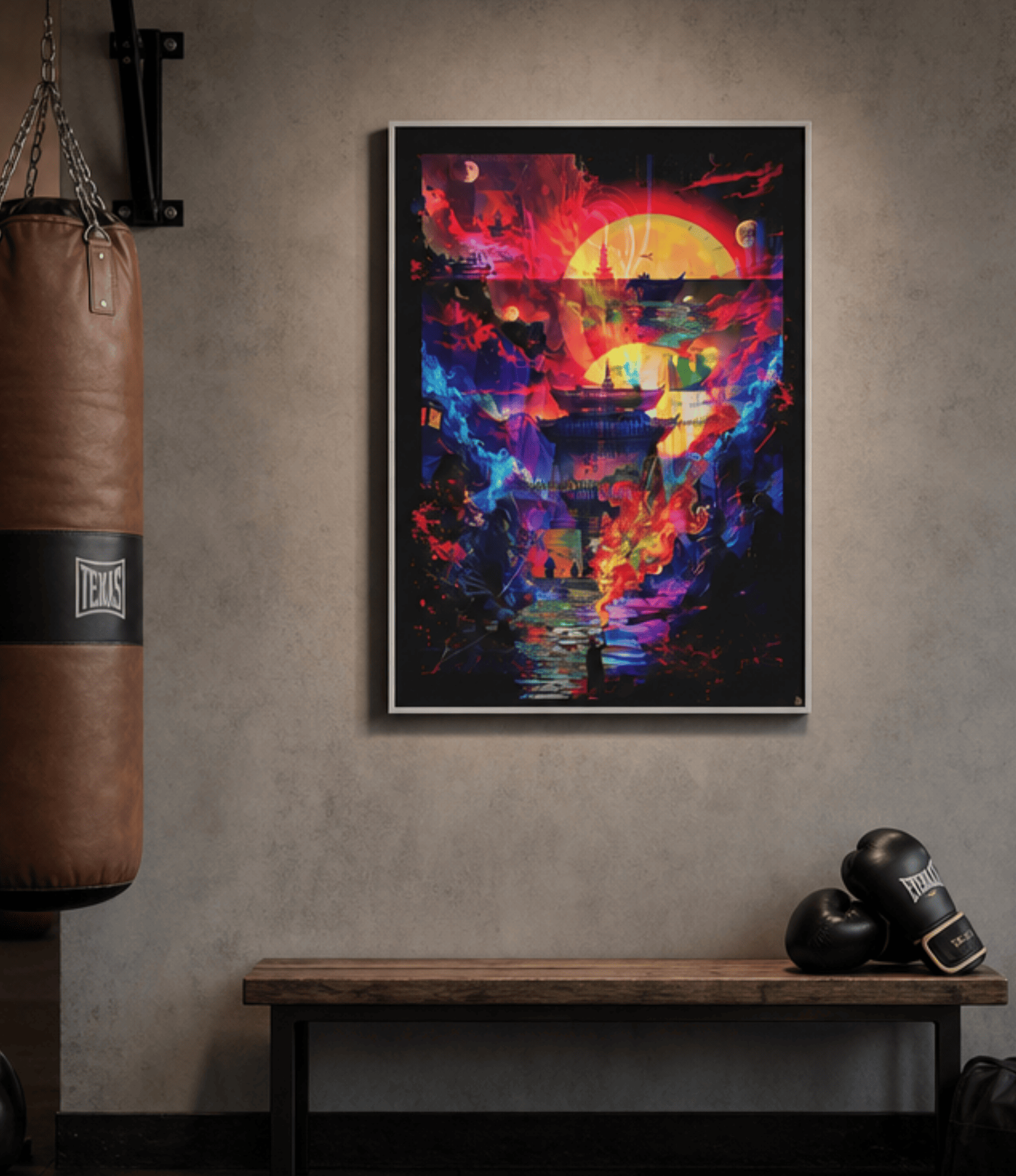 A framed vertical art print featuring a vibrant, colourful abstract design with a large red and yellow sun, blue and purple clouds, and a dark landscape, hanging on a textured grey wall in a gym setting with a punching bag and boxing gloves.