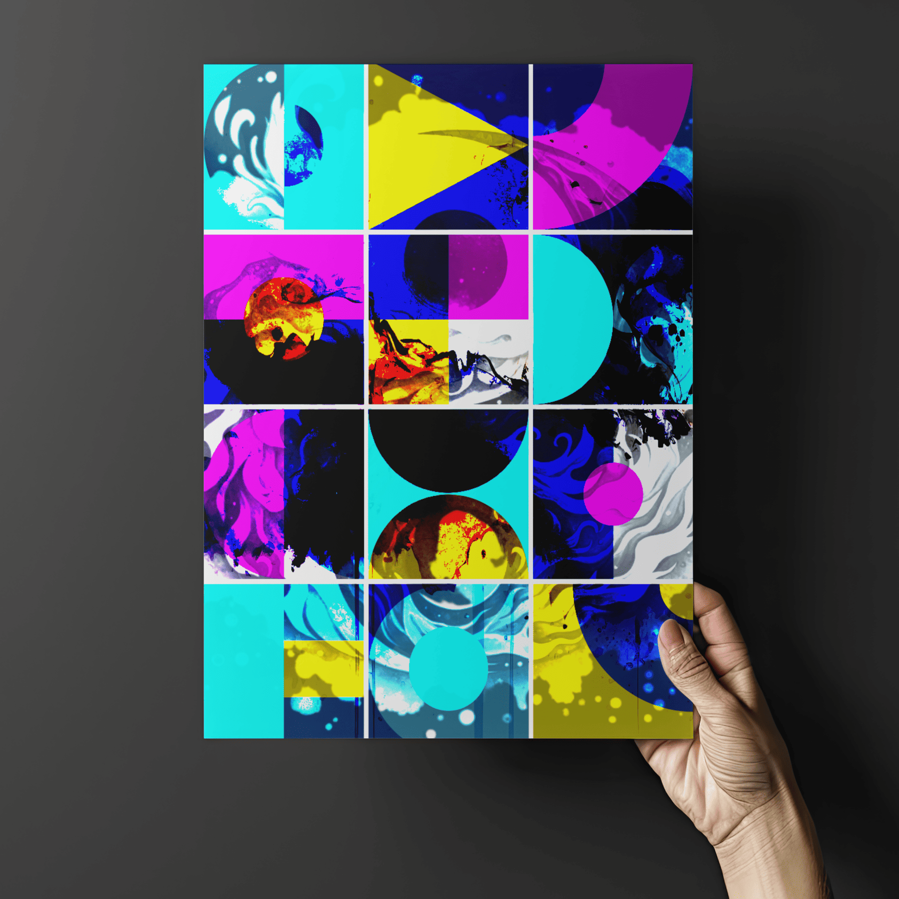 A framed abstract art print with a 3x3 grid of bright, contrasting geometric and organic shapes in cyan, magenta, yellow, black, and purple, displayed on a light grey wall in a modern, stylishly decorated living room.