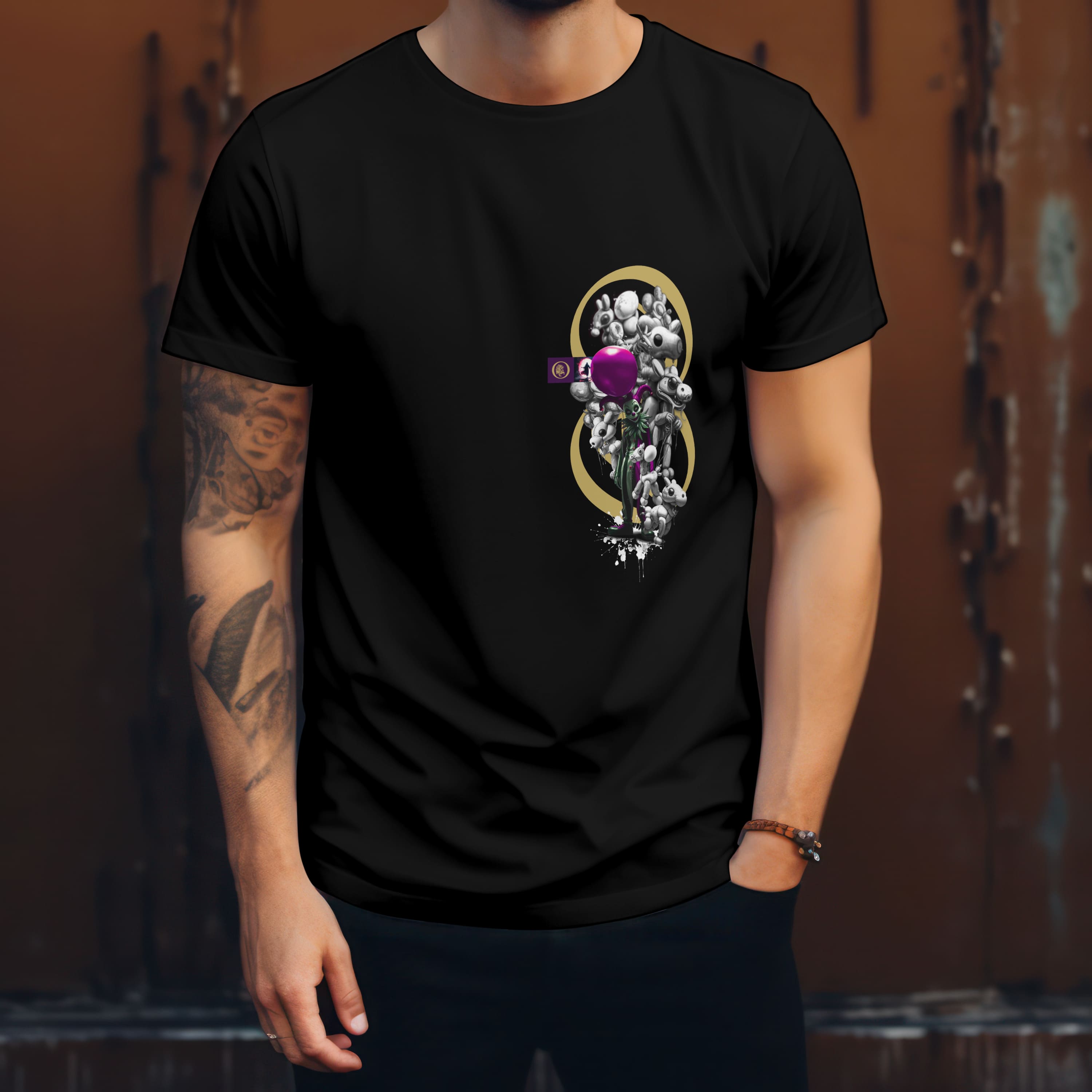 Person wearing a black t-shirt with a colorful graphic design on a brown background